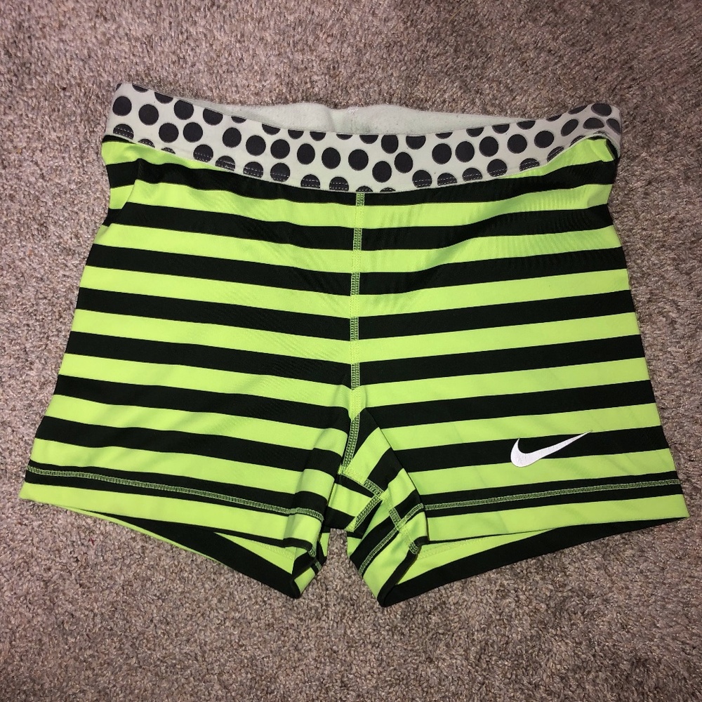 lime green and black nike pros